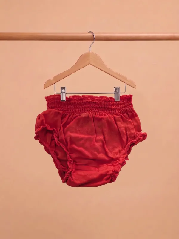 Culotte rouge — 0-3 mois · Bébé et enfant, dressing du studio de Julie Dugardin Photographe